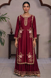 Model wearing a maroon long kurti with gold floral embroidery and a matching flared gharara.
